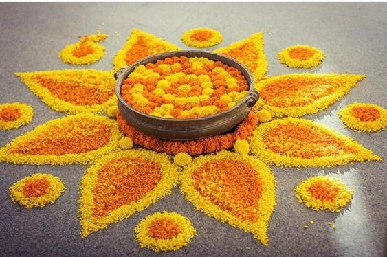 Make Rangolis using flowers, leaves and organic colours